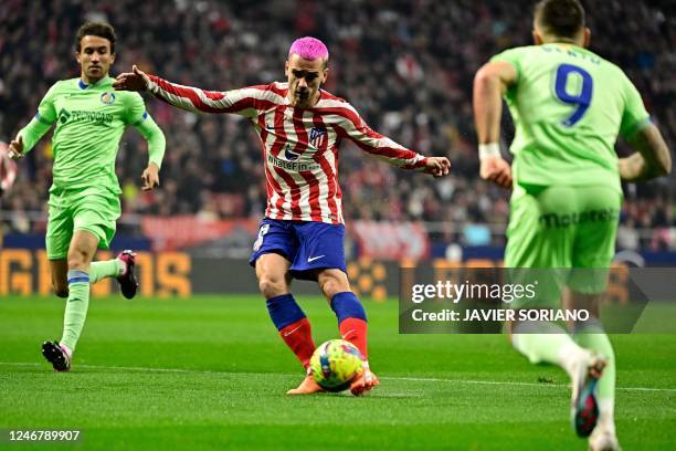 Atletico Madrid's French forward Antoine Griezmann controls the ball during the Spanish league football match between Club Atletico de Madrid and...