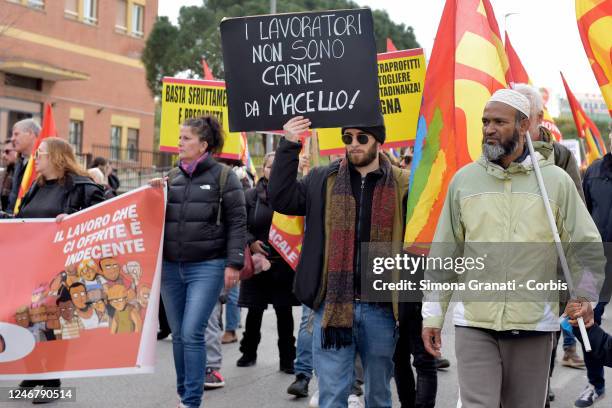 Workers, students and protesters take part in the demonstration in the popular Centocelle district, in favor of basic income, against the government...