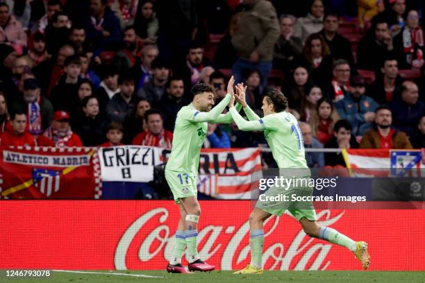 Enes Unal of Getafe CF celebrates 1-1 with Munir El Haddadi of Getafe CF during the La Liga Santander match between Atletico Madrid v Getafe at the...