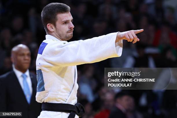 Ukraine's BogdanIadov reacts after winning Mongolia's Erkhembayar Battogtokh during the Final Mens's -66kg category at the Paris Grand Slam judo...
