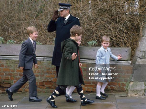 British royal children, left to right: Peter Phillips, Lord Frederick Windsor and HRH Prince William with a policeman outside St George's Chapel in...