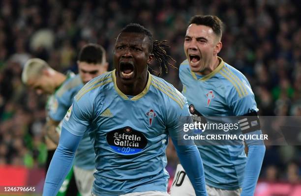 Celta Vigo's Ghanaian defender Joseph Aidoo celebrates with teammates scoring his team's fourth goal during the Spanish league football match between...