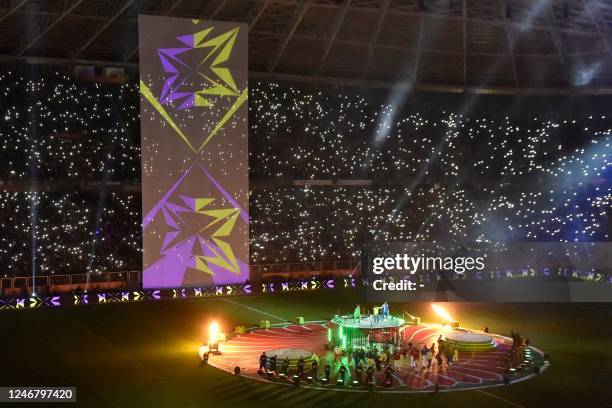 Dancers perform during the closing ceremony of the 2022 African Nations Championship ahead of the final football match between Algeria and Senegal at...