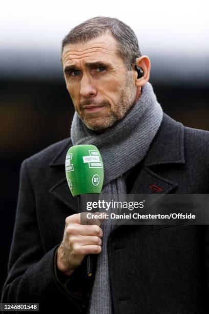 Sport Presenter Martin Keown holds a Green Football Weekend microphone before the Premier League match between Everton FC and Arsenal FC at Goodison...