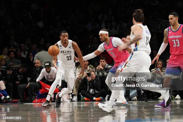 Nicolas Claxton of the Brooklyn Nets passes the ball during the game against the Washington Wizards on February 4, 2023 at the Barclays Center in...