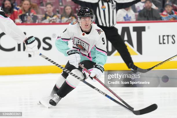 Central Clayton Keller looks for passing outlet during game three of the Honda NHL All-Star Game between the Metro and Atlantic Divisions on...