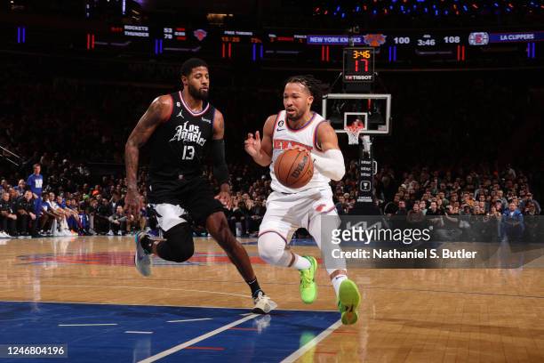 Jalen Brunson of the New York Knicks drives to the basket against defender Paul George of the LA Clippers during the game on February 4, 2023 at...
