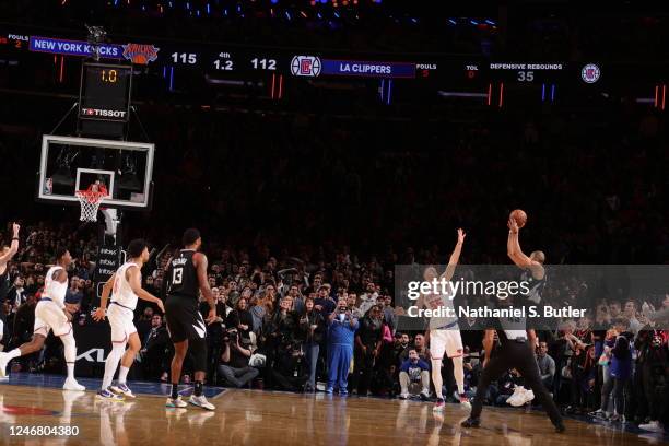 Nicolas Batum of the LA Clippers shoots a three point basket to tie the game against the New York Knicks and send it to overtime on February 4, 2023...