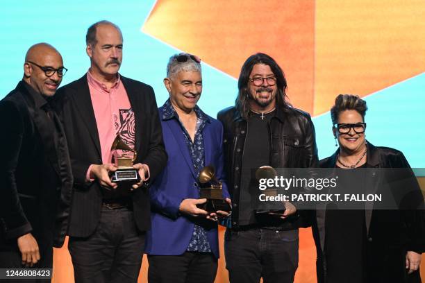 Recording Academy CEO Harvey Mason Jr., Us musicians Krist Novoselic, Pat Smear, Dave Grohl, and Recording Academy Chair Tammy Hurt celebrate...