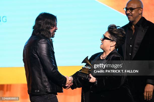 Musician Dave Grohl receives from Recording Academy Chair Tammy Hurt the Lifetime Achievement Award for Nirvana during the Recording Academys Special...