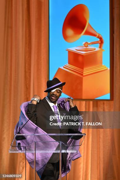 Lifetime Achievement Award honoree US rapper Slick Rick speaks onstage during the Recording Academys Special Merit Awards at the Wilshire Ebell...