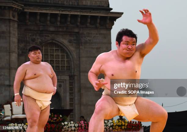 Japanese Sumo wrestlers demonstrate a move at the signing of Memorandom Of Understanding between Maharashtra and Japan's Wakayama prefecture, to...