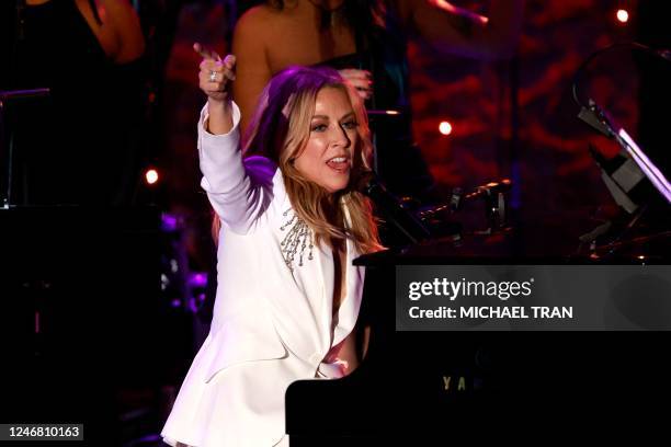 Singer/songwriter Sheryl Crow performs on stage during the Recording Academy and Clive Davis pre-Grammy gala at the Beverly Hilton hotel in Beverly...