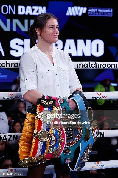 Irish Boxer Katie Taylor poses with her Championship belts in the