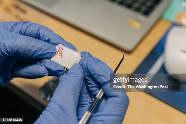 Drug check technician Yarelix Estrada holds DOPE to test inside the drug test room at OnPoint NYC in the Harlem neighborhood of New York on January...