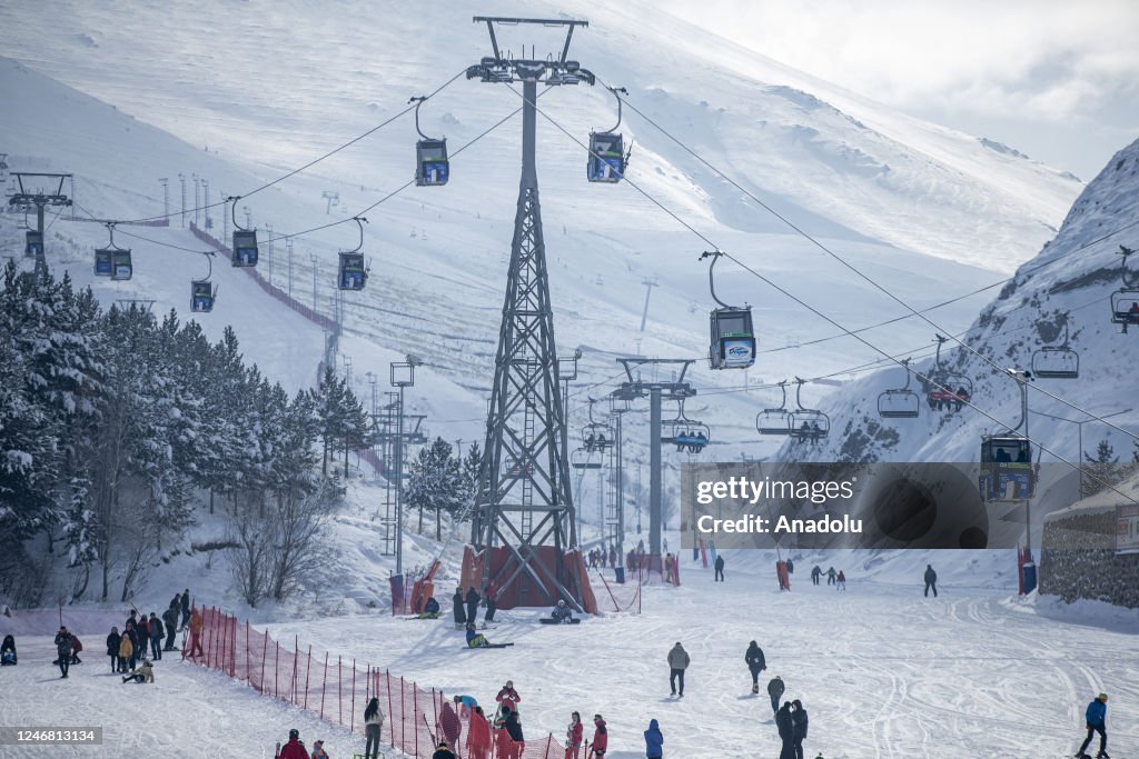 People enjoy the snow at Palandoken Ski Center in Turkiye's Erzurum