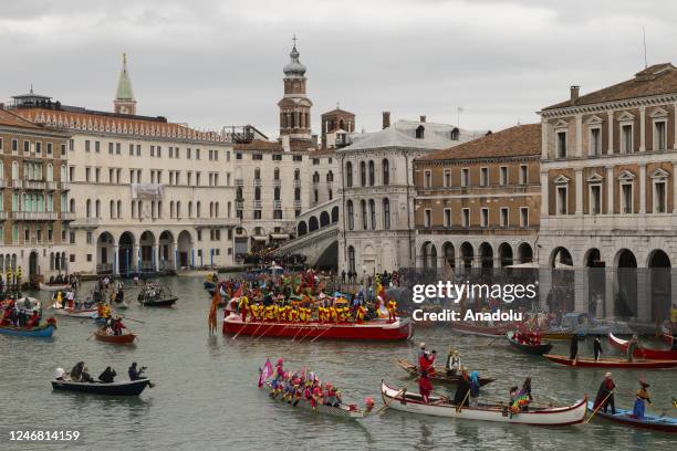 Rowers wearing costumes sail along Grand Canal during the Carnival Regatta for the opening of the 2023 Venice Carnival on February 5 in Venice,...
