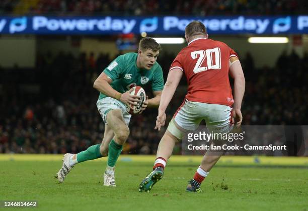 Garry Ringrose of Ireland take on Tommy Reffell of Wales during the Six Nations Rugby match between Wales and Ireland at Principality Stadium on...