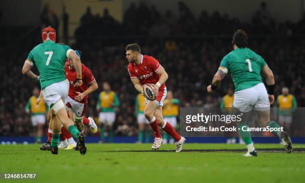 Dan Biggar of Wales looks to offload during the Six Nations Rugby match between Wales and Ireland at Principality Stadium on February 4, 2023 in...
