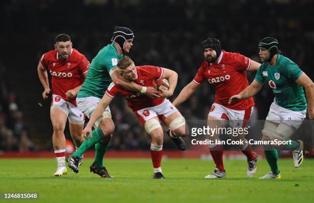 Jac Morgan of Wales is tackled by James Ryan of Ireland during the Six Nations Rugby match between Wales and Ireland at Principality Stadium on...