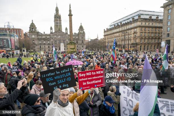 Demonstrators take part in the Let Women Speak rally organised by the group Standing for Women in George Square, Glasgow, in support of the UK...