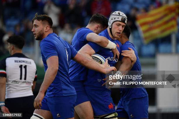 France's lock Thibaud Flament celebrates after scoring the first try during the Six Nations international rugby union match between Italy and France...