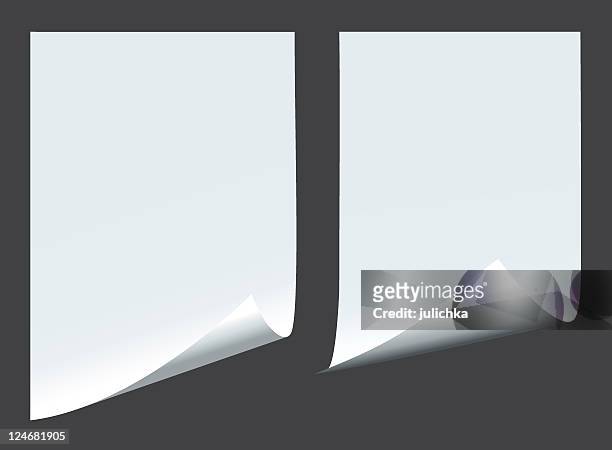 two blank pieces of paper on a dark background - bent stock illustrations