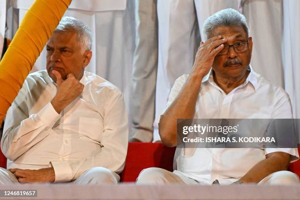 Sri Lanka's President Ranil Wickremesinghe along with country's former President Gotabaya Rajapaksa attend the annual Buddhist Navam procession at...