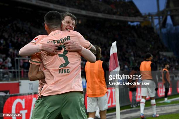 Jens Stange of SV Werder Bremen celebrates after scoring his team's first goal with teammates during the Bundesliga match between VfB Stuttgart and...