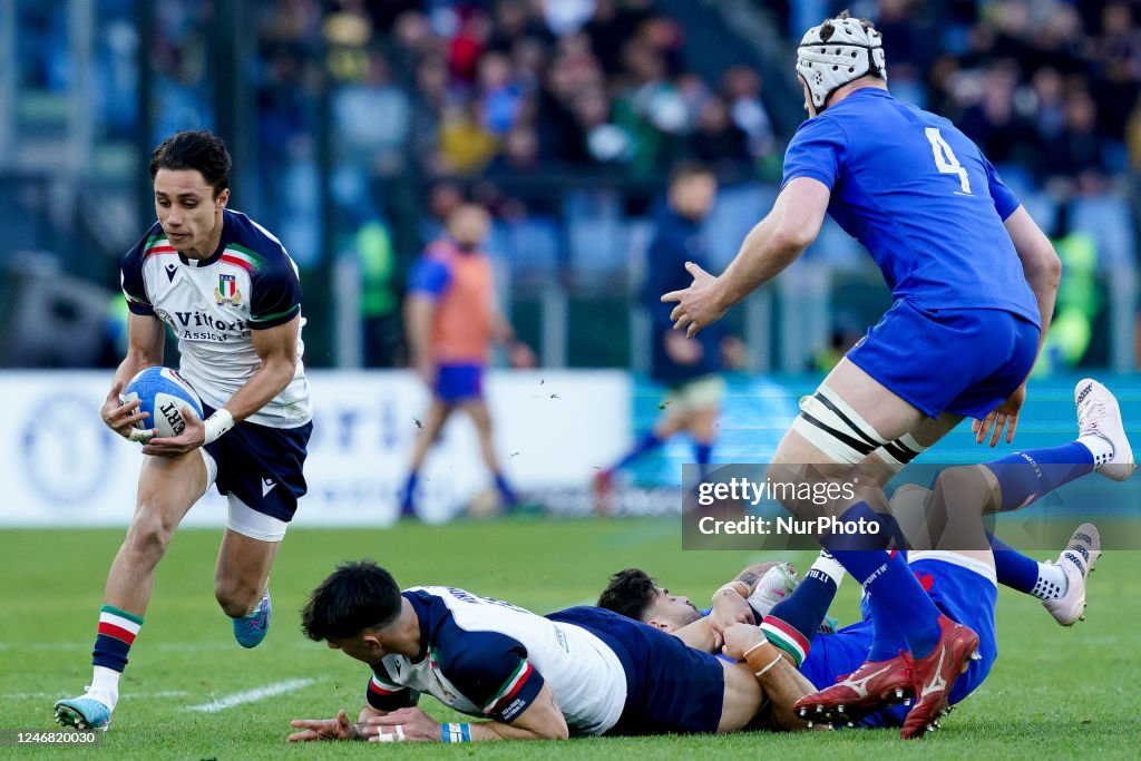 Ange Capuozzo of Italy in action during the Six Nations Rugby match Ange Capuozzo of Italy in action during the Six Nations Rugby match