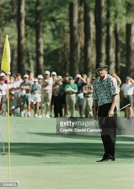 Greg Norman of Australia looks on in dejection after missing another putt during the final round of the 1996 Masters at Augusta National Golf Club in...