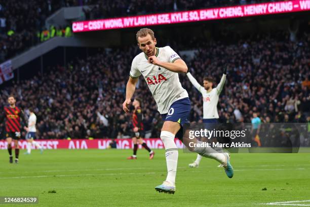 Harry Kane of Tottenham Hotspur celebrates scoring the team's first goal. Kane scored his 267th goal and overtakes the late Jimmy Greaves to become...