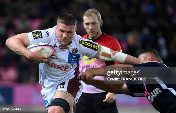 Bordeaux-Begles' English number 8 Tom Willis runs with the ball during the French Top 14 rugby union match between Stade Francais Paris and Union...