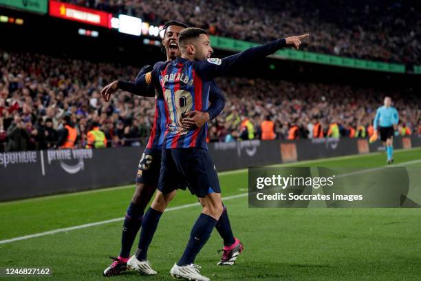 Jordi Alba of FC Barcelona celebrates 1-0 with Jules Kounde of FC Barcelona during the La Liga Santander match between FC Barcelona v Sevilla at the...