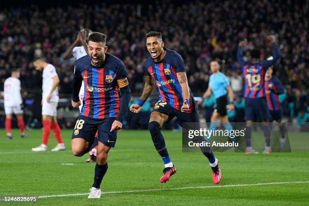 Barcelona's Spanish defender Jordi Alba celebrates his goal during the Spanish league football match between FC Barcelona vs Sevilla FC at the Camp...