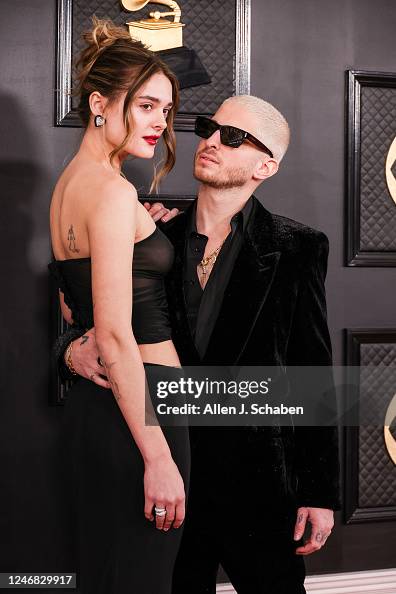 65th GRAMMY AWARDS Andrew Watt and Charlotte Lawrence attend the 65th