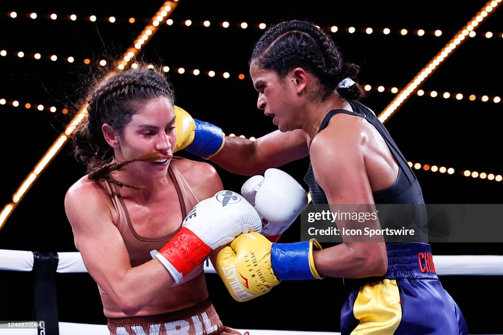 Ramla Ali exchanges punches Avril Mathie during their women's junior ...
