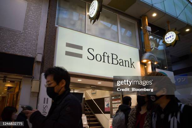 Pedestrians past a SoftBank Corp. Store in Tokyo, Japan, on Sunday, Feb. 5, 2023. SoftBank Group Corp. Is scheduled to release its third-quarter...