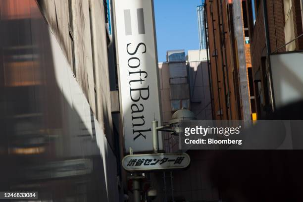 Signage displayed outside a SoftBank Corp. Store in Tokyo, Japan, on Sunday, Feb. 5, 2023. SoftBank Group Corp. Is scheduled to release its...
