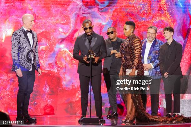 Wouter Kellerman, Zakes Bantwini, and Nomcebo Zikode accept the award for Best Global Music Performance onstage at the 65th Annual GRAMMY Awards...