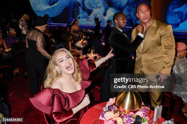 Adele, Rich Paul and Dwayne Johnson at THE 65TH ANNUAL GRAMMY AWARDS, broadcasting live Sunday, February 5, 2023 on the CBS Television Network, and...