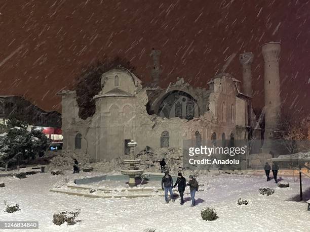 View of partially damaged historical Yeni Mosque after the earthquake on February 6, 2023 in Malatya, Turkiye. Search and rescue works continue in...