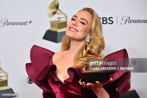 English singer-songwriter Adele poses with the award for Best Pop Solo Performance for "Easy on Me" in the press room during the 65th Annual Grammy...