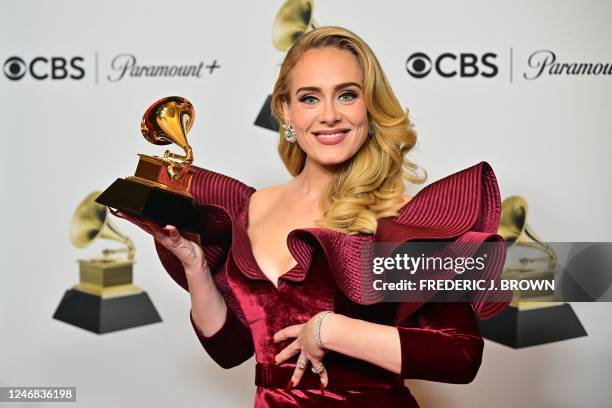 English singer-songwriter Adele poses with the award for Best Pop Solo Performance for "Easy on Me" in the press room during the 65th Annual Grammy...