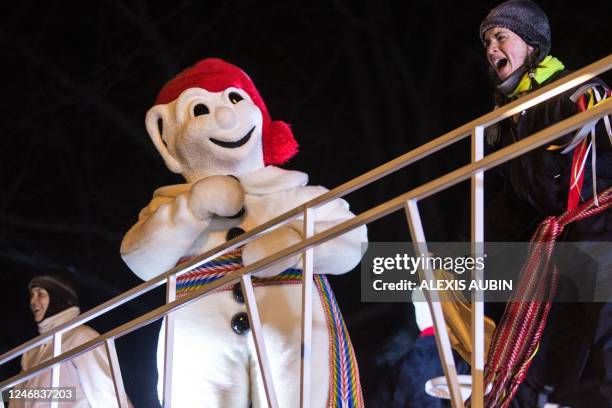 Quebec Winter Carnival's official mascot, "Le Bonhomme Carnival" , takes part in a parade in Quebec City, Canada, on February 4, 2023. - The Quebec...