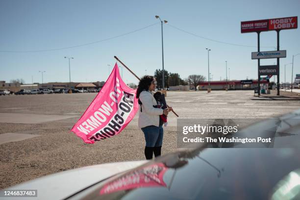 Steering Commitee member Victoria Robledo holds her two-month-old son Sylas Robledo during a pro-choice rally held by Eastern New Mexico Rising in...