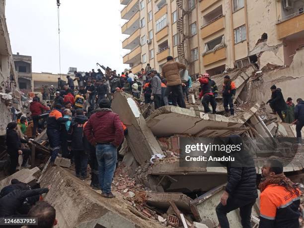 View of debris as rescue workers conduct search and rescue operations after a 7.4 magnitude earthquake hit southern provinces of Turkiye, in...