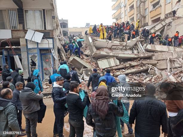 View of debris as rescue workers conduct search and rescue operations after a 7.4 magnitude earthquake hit southern provinces of Turkiye, in...