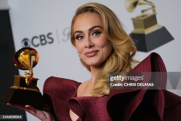 English singer-songwriter Adele poses with the award for Best Pop Solo Performance for "Easy on Me" in the press room during the 65th Annual Grammy...