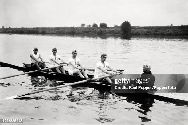 The coxed four rowing team of France, silver medallists, at the Summer Olympic Games in Paris, France on 19th July 1924. The team includes Eugene...